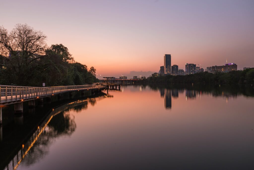 An image of The Boardwalk at night near the lady bird lake