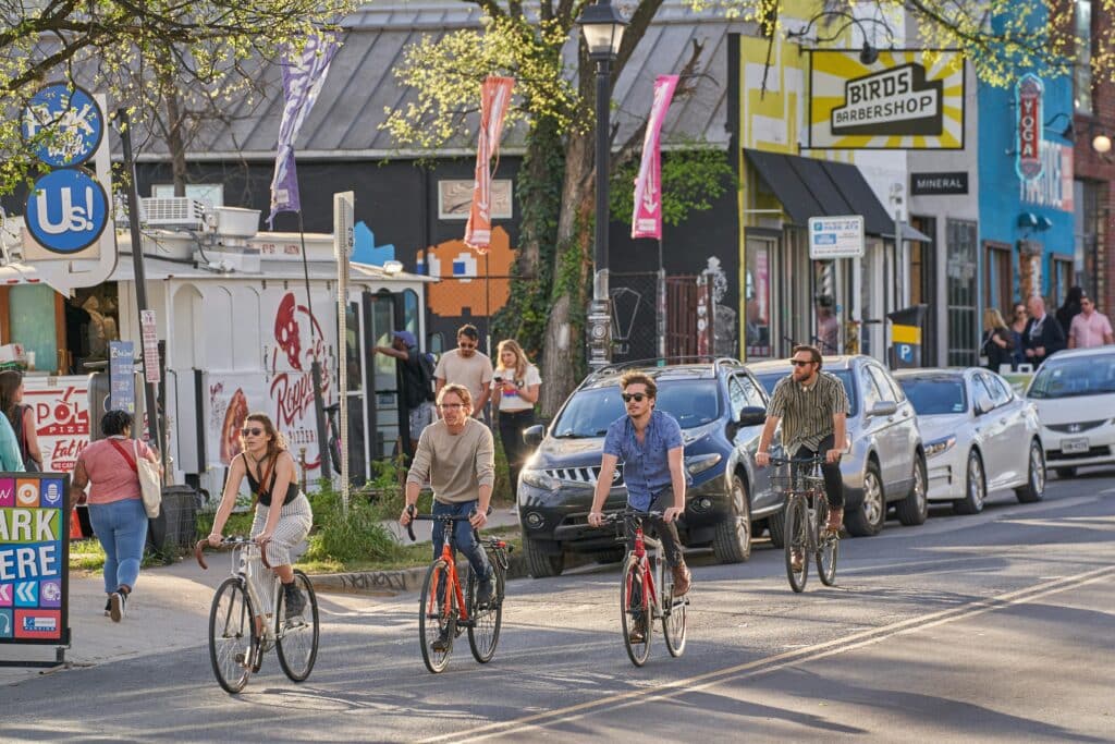 people riding a bike in austin